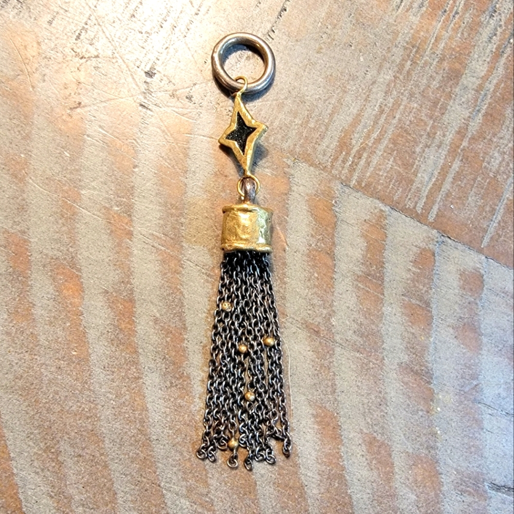 Waxing Poetic Silver, Brass pendant 2 1/2"